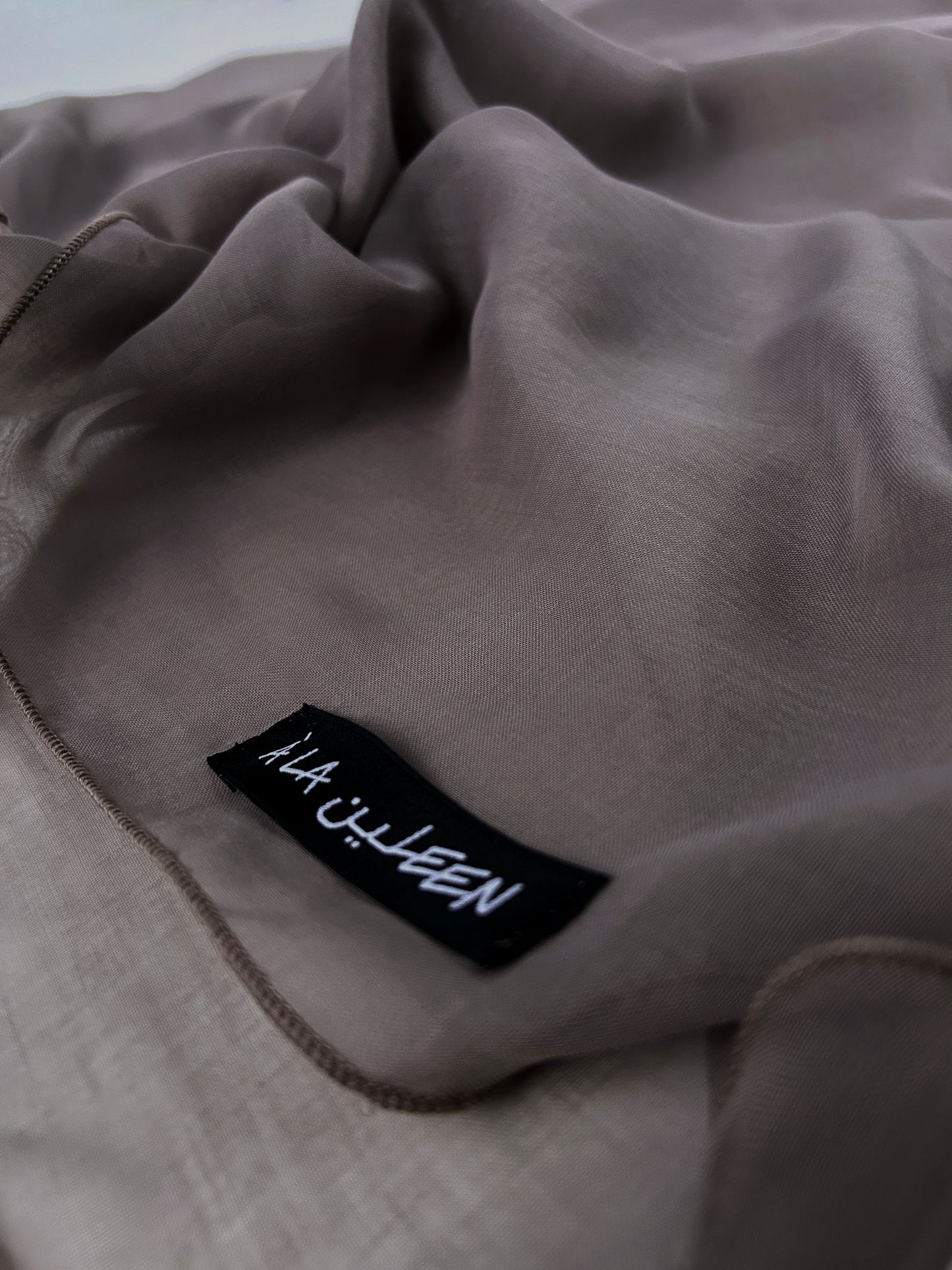 The à la Leen Voile Scarf with Wavy Hems- Cool Taupe with a mauve-grey undertone